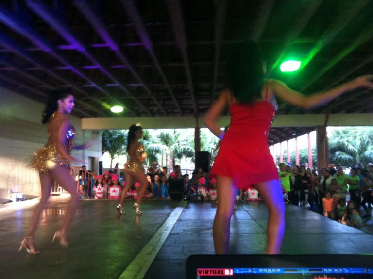 Guests dancing under a covered pavilion during an event