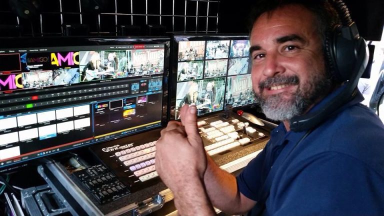 DJ 2RO at a video production switcher with multiple camera monitors